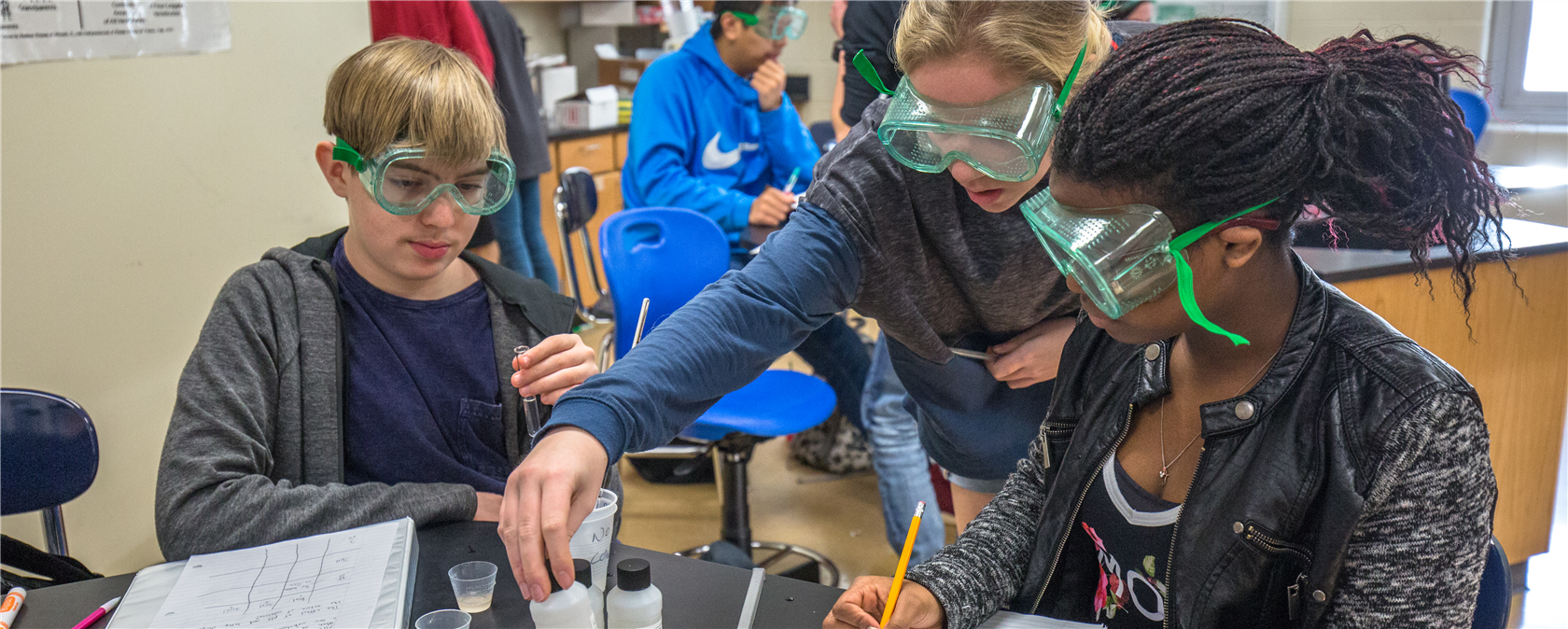 Learning Communities High School - CMS students working on chemical lab studies